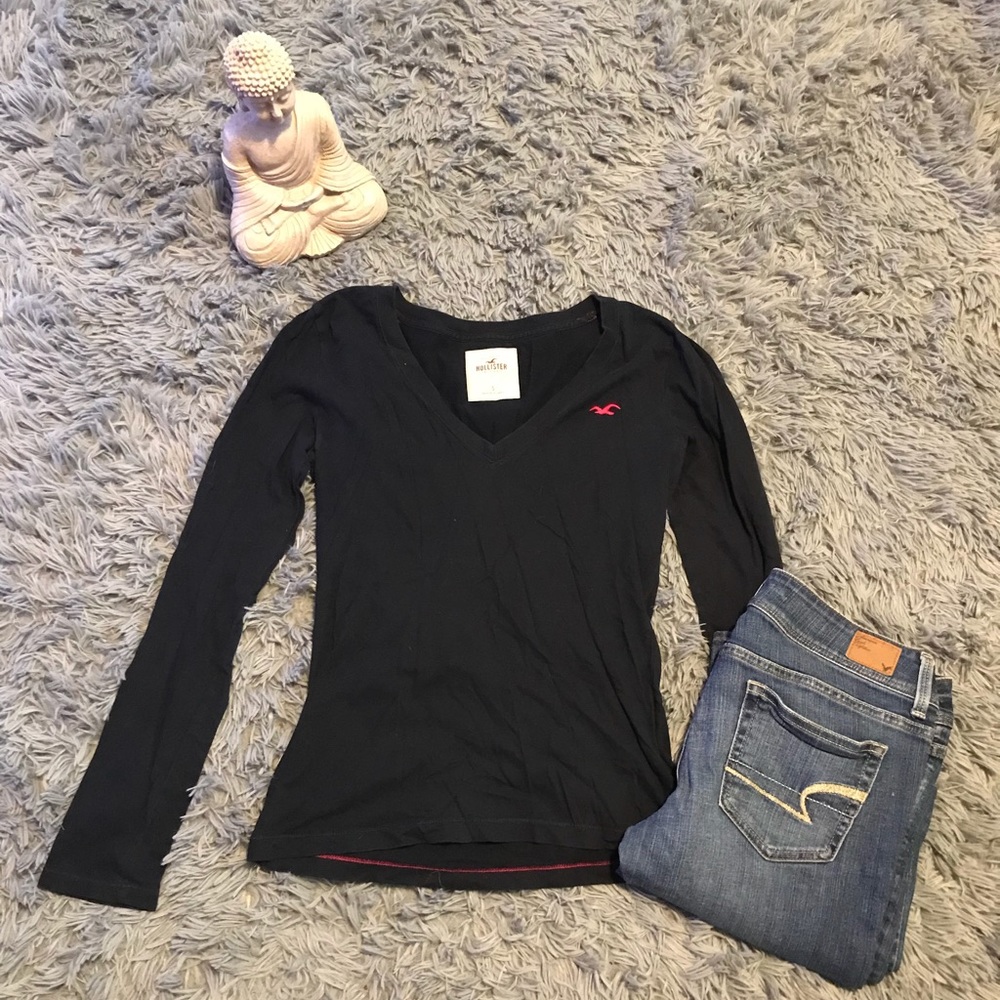 Dark blue long sleeve Hollister shirt.